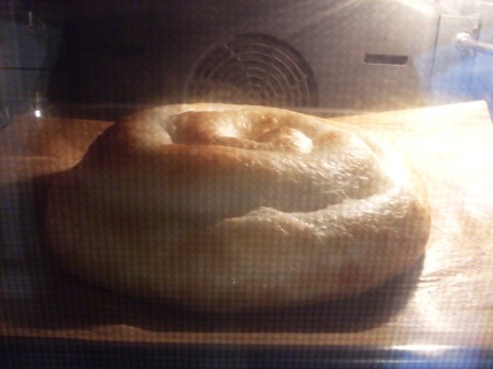 069 - ensaïmada llisa al forn.JPG